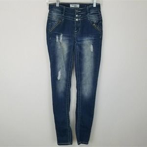 Distressed skinny jeans. Dark wash